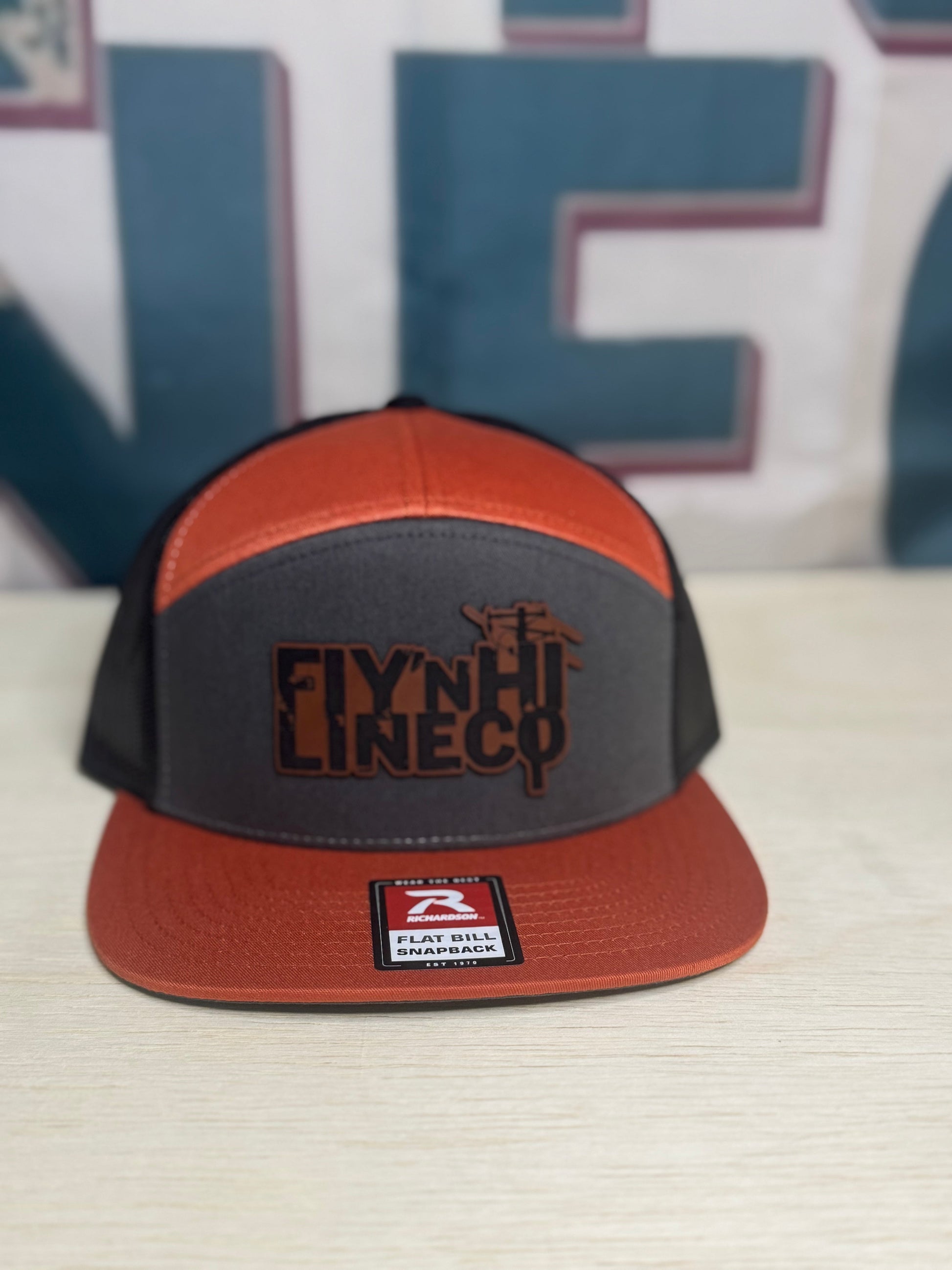 Orange and grey 7 panel. Fly’N Hi Lineco